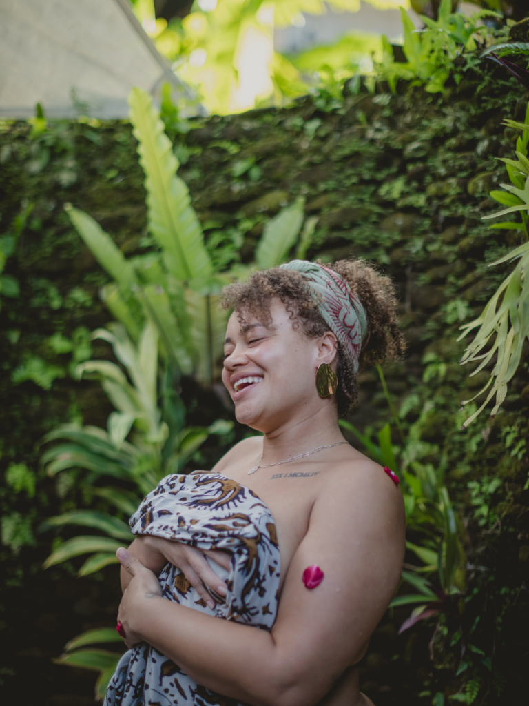 Radiant woman at transformational women's retreat in Ubud Bali 2026 — The Alchemist Experience at 11:11 Bali Retreats